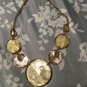 Gold toned Fashion necklace with rhinestones and peach looking stone